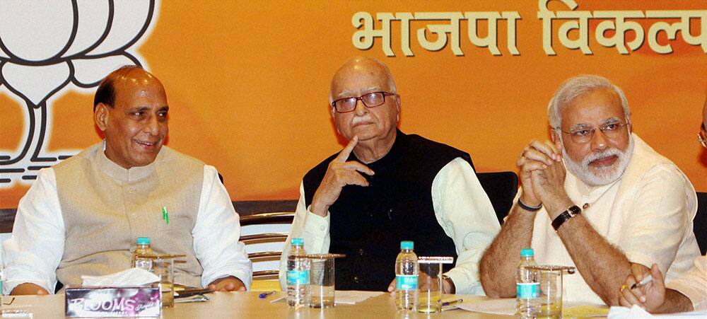 BJP President Rajnath Singh, party`s PM candidate Narendra Modi and LK Advani during party`s Central Election Committee (CEC) meeting in New Delhi.