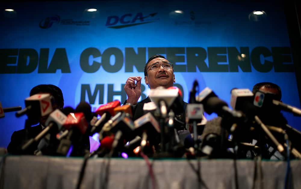Malaysia`s Minister of Transport Hishamuddin Hussein takes questions from the media during a press conference about the missing Malaysia Airlines jetliner MH370 in Sepang, Malaysia.