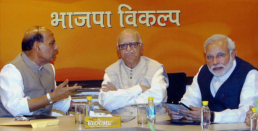 BJP President Rajnath Singh, party`s PM candidate Narendra Modi and senior leader LK Advani during party`s Central Election Committee (CEC) meeting in New Delhi.