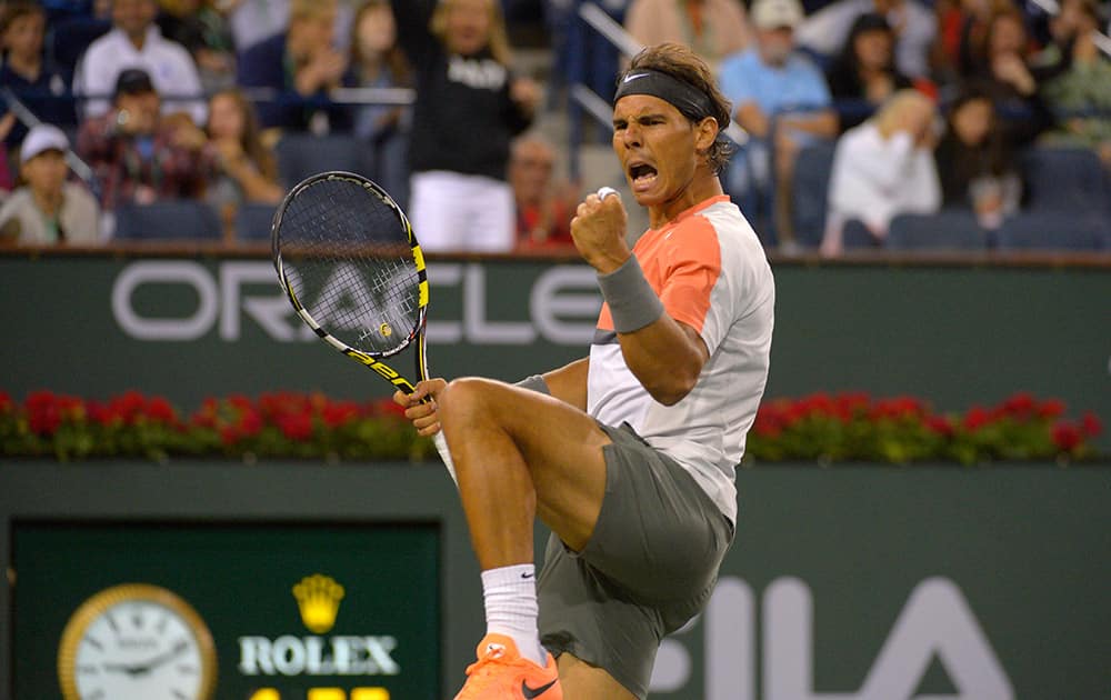 Rafael Nadal, of Spain, reacts to winning a point over Radek Stepanek, of the Czech Republic, in their match at the BNP Paribas Open tennis tournament.