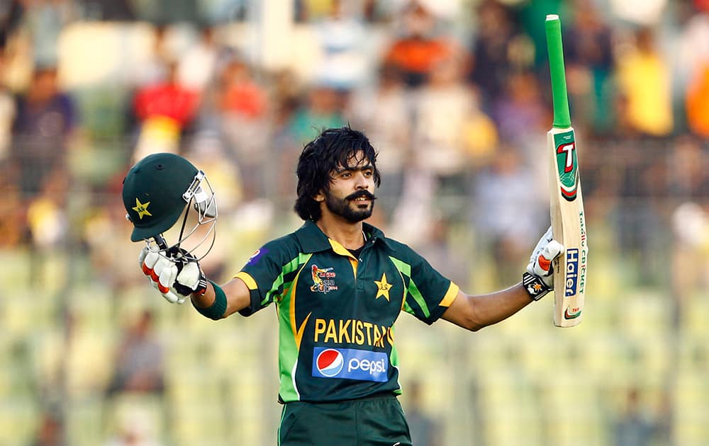 Pakistan’s cricket player Fawad Alam celebrates after scoring a century against Sri Lanka during their Asia Cup final cricket match in Dhaka, Bangladesh.