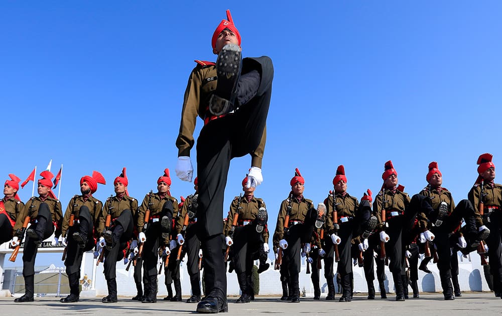 Newly graduated soldiers of the Jammu and Kashmir Light Infantry march during their commencement parade at a military base on the outskirts of Srinagar.