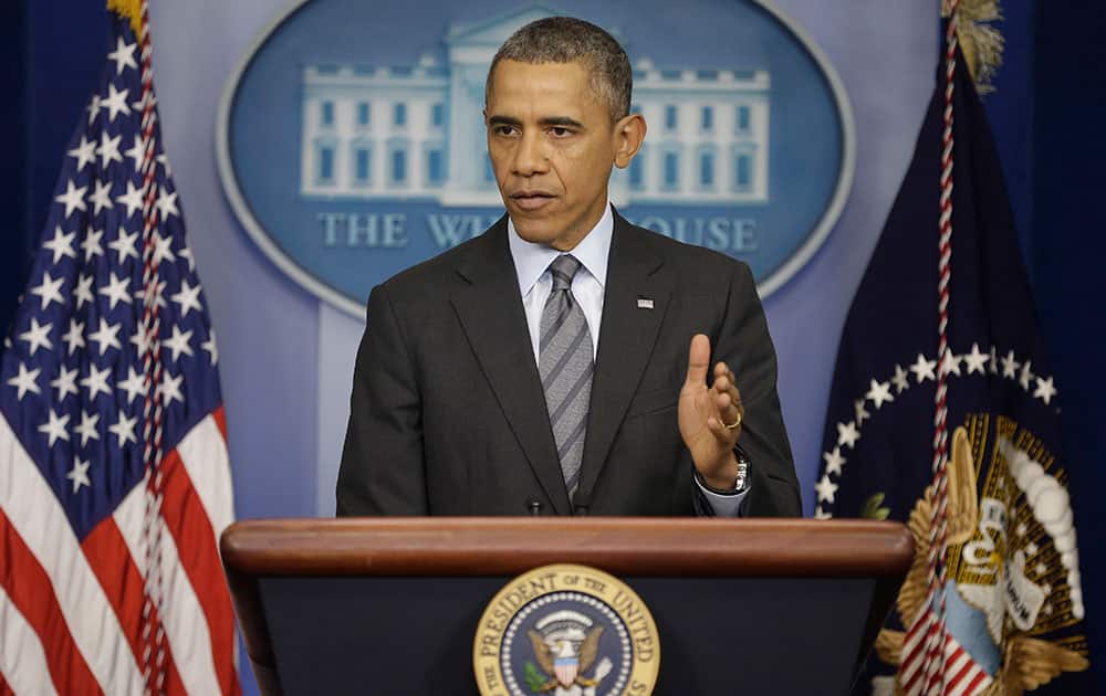 President Barack Obama talks about the situation in Ukraine, in the briefing room of the White House in Washington.