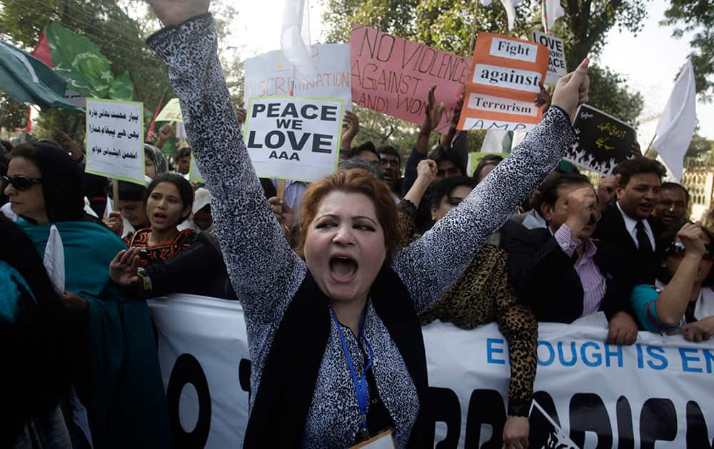 Members of Pakistan`s civil society shout slogans during a protest against terror attacks in Lahore, Pakistan.