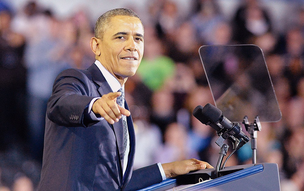 President Barack Obama talks to the crowd at Central Connecticut State University during a speech about raising the minimum wage.