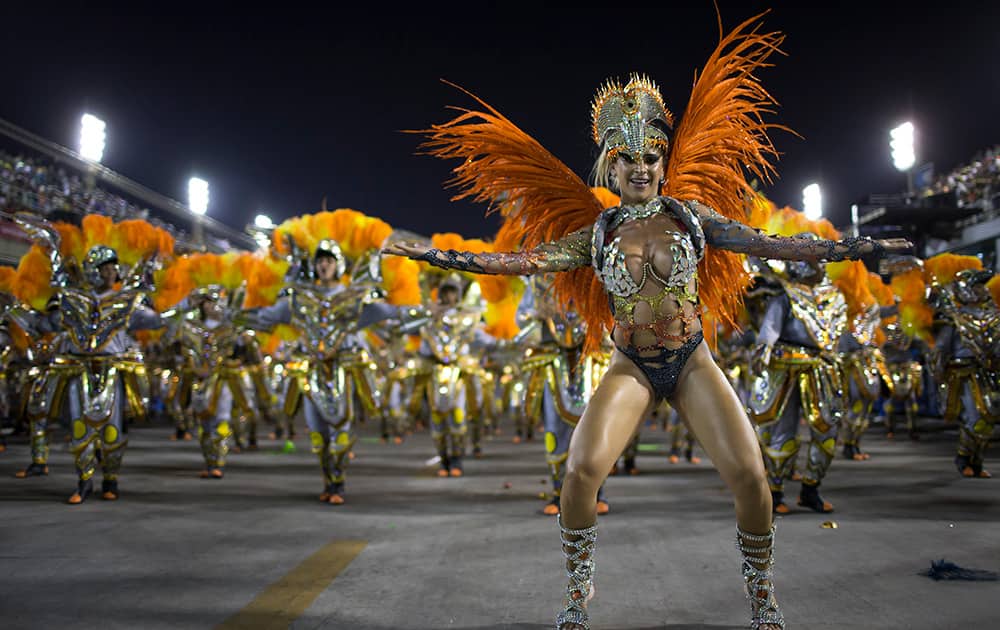 Performers from the Unidos da Tijuca samba school parade during carnival celebrations at the Sambadrome in Rio de Janeiro, Brazil.