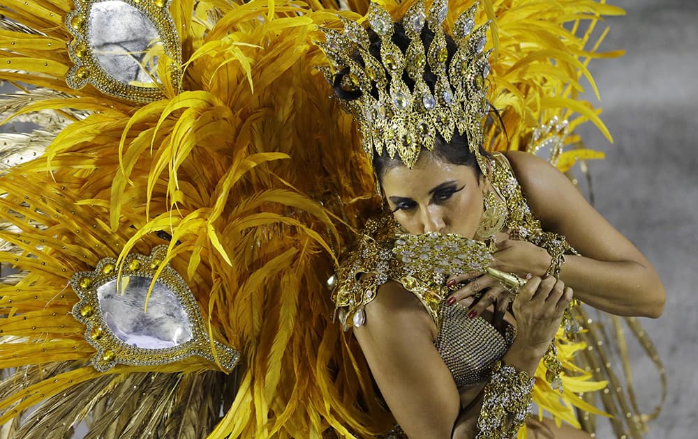 Drum Queen Patricia Nery performs at Portela samba school parade during carnival celebrations at the Sambadrome in Rio de Janeiro.