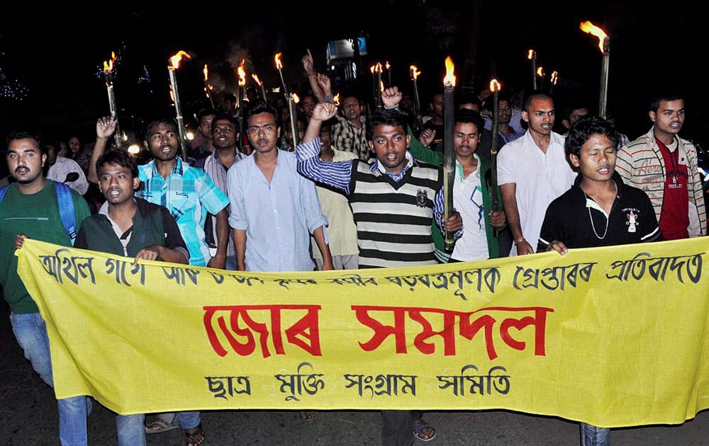 Activists of the Satra Mukti Sangram Samity (SMSS) , a student wing of KMSS take out a torch light procession in Guwahati on Sunday, protesting against the arrest of Krishak Mukti Sangram Samiti (KMSS) President Akhil Gogoi arrested by Assam police from his Nijarapara residences in the wee hours on Sunday.