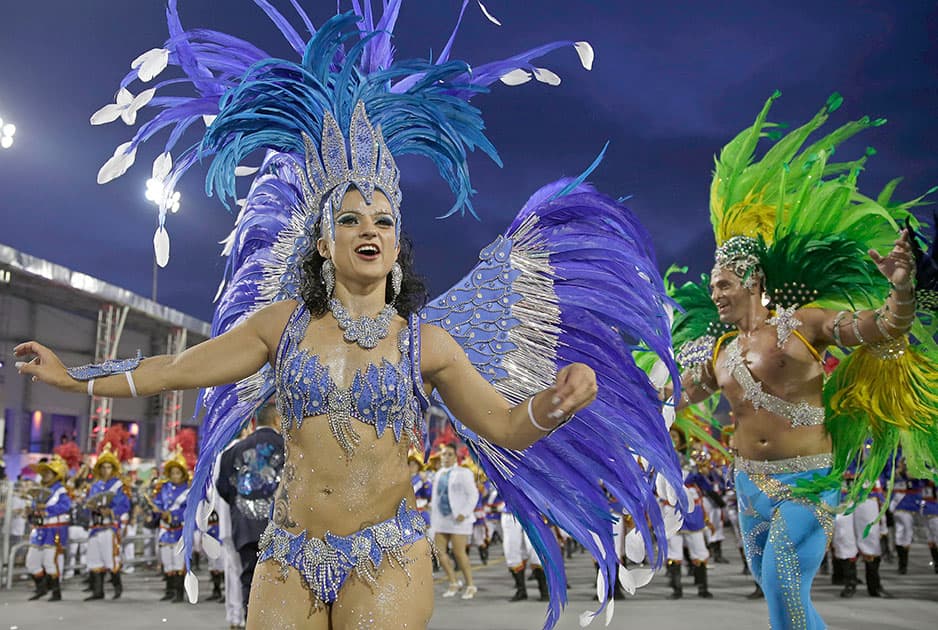 Dancers from the Academicos do Tatuape samba school perform during a carnival parade in Sao Paulo, Brazil.