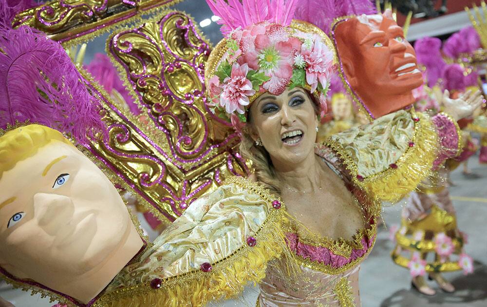 A dancer from the Nene de Vila Matilde samba school performs during a carnival parade in Sao Paulo, Brazil.