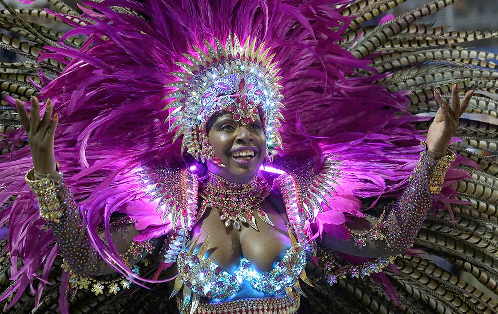 A dancer from the Nene de Vila Matilde samba school performs during a carnival parade in Sao Paulo, Brazil.