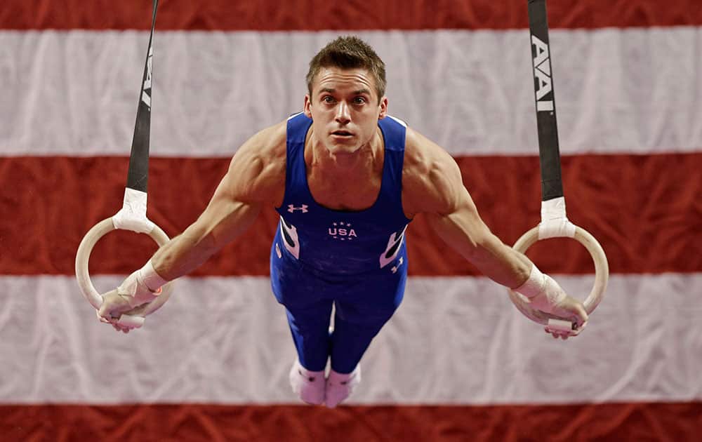 Sam Mikulak performs on the rings during the American Cup gymnastics competition in Greensboro, N.C.