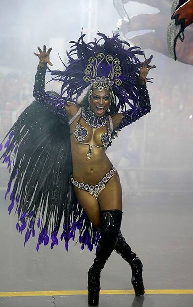 A dancer from the Rosas de Ouro samba school performs during a carnival parade in Sao Paulo, Brazil.