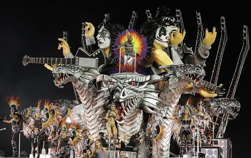 Dancers from the Dragoes da Real samba school perform on a float during a carnival parade in Sao Paulo, Brazil.