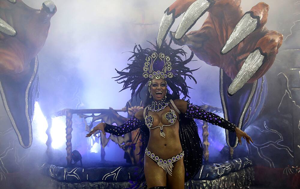 A dancer from the Rosas de Ouro samba school performs during a carnival parade in Sao Paulo, Brazil.