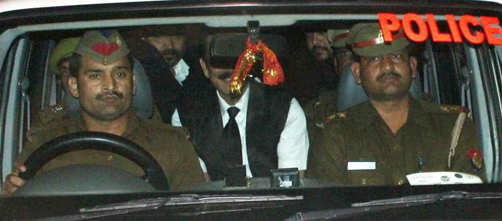 Sahara Chief Subrata Roy being taken by the police after the court handed his custody to them in Lucknow.