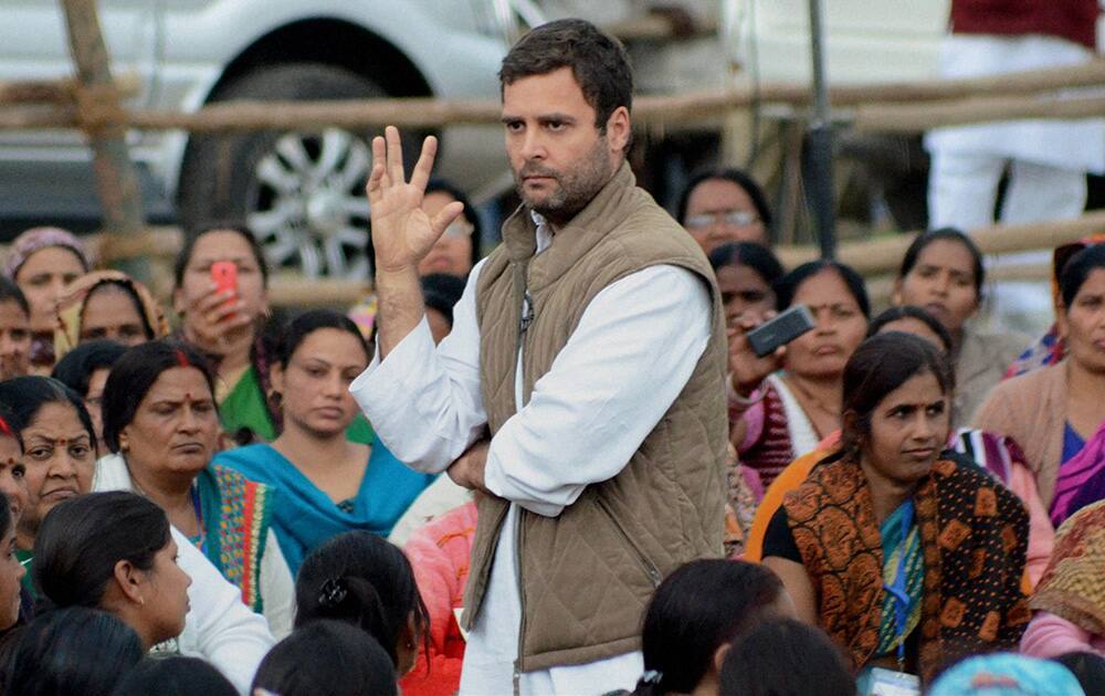 Rahul Gandhi interacts with `aanganwadi` workers and cooks of mid-day meals at Chinhat in Lucknow.