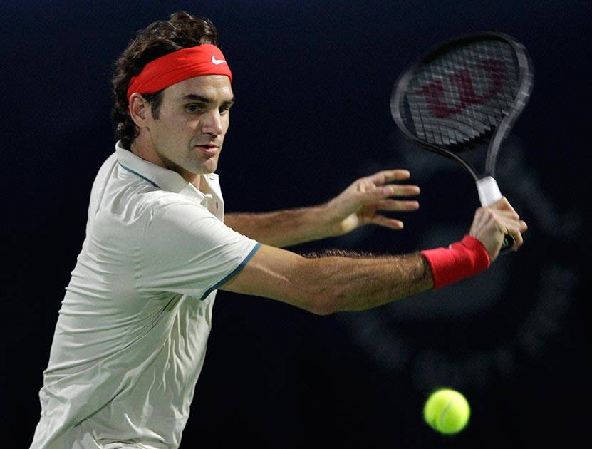 Roger Federer of Switzerland returns the ball to Radek Stepanek of the Czech Republic during the third day of the Dubai Duty Free Tennis Championships in Dubai, United Arab Emirates.