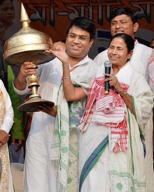 West Bengal Chief Minister Mamata Banerjee being felicitated with Assamese traditional “Sorai” during “Mother Land and its People’s” rally in Guwahati.