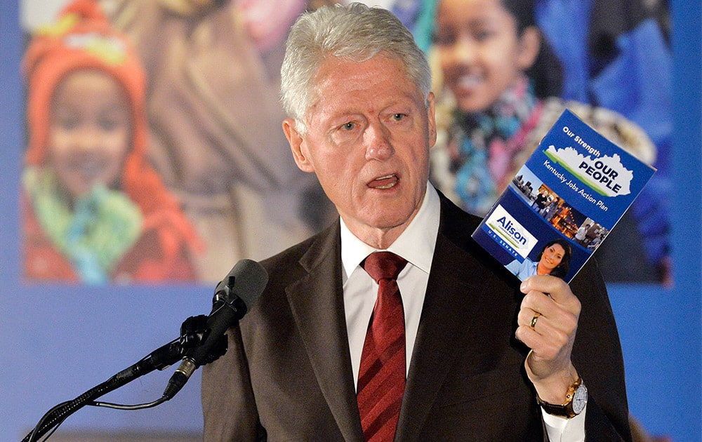 Former President Bill Clinton speaks to a group of supporters during a fundraiser for Democratic Senate challenger Alison Lundergan Grimes in Louisville, Ky.