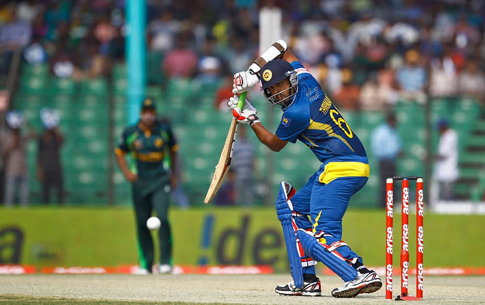 Sri Lanka’s Lahiru Thirimanne plays a shot against Pakistan during their opening match of the Asia Cup one-day international cricket tournament in Fatullah, near Dhaka, Bangladesh.