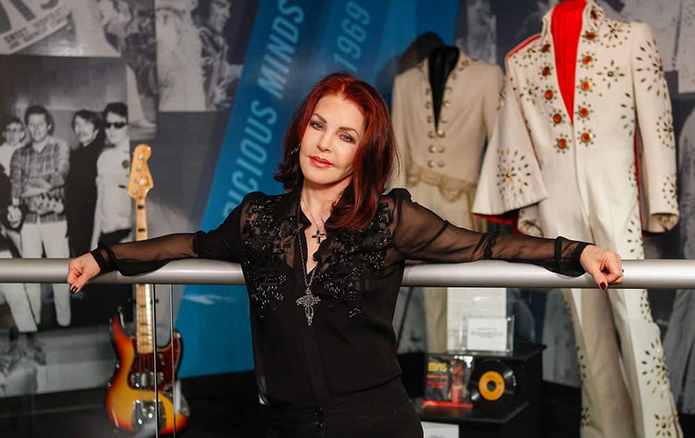 Priscilla Presley stands in the `60 years of Elvis` exhibit inside an annex at Graceland in Memphis, Tenn.