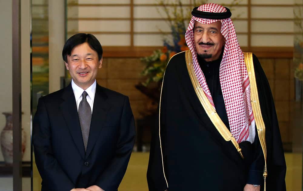 Saudi Arabia`s Crown Prince Salman bin Abdul Aziz al-Saud, right, and Japan`s Crown Prince Naruhito, left, stand togetherat the Togu Palace in Tokyo.