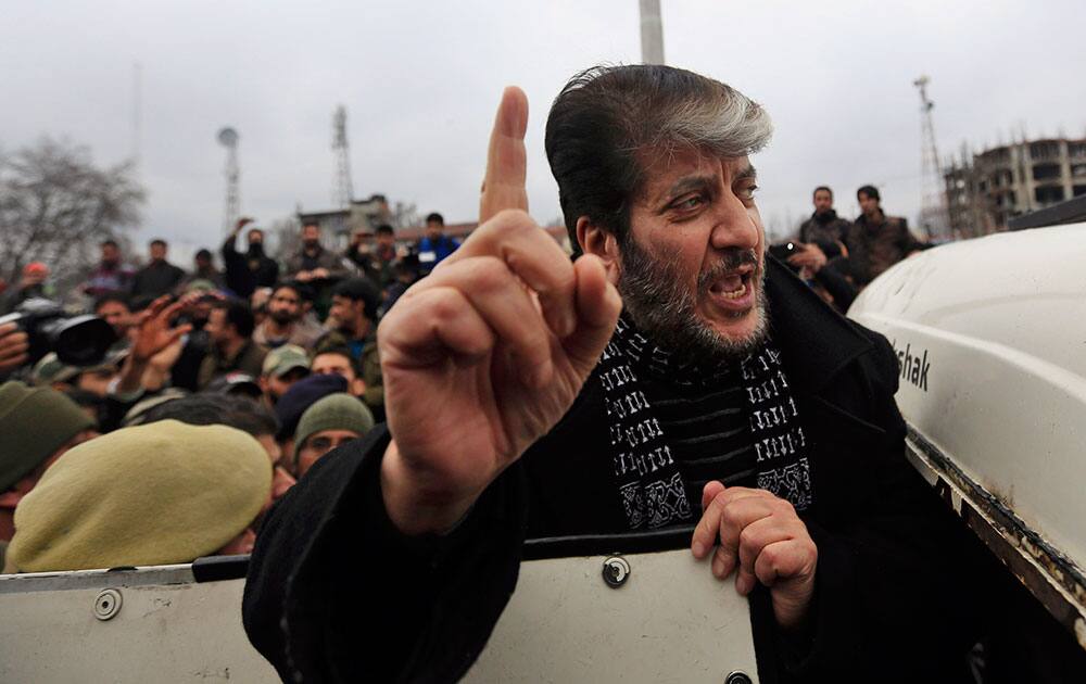 Senior Kashmiri leader Shabir Ahmad Shah speaks as he is detained by police during a protest in Srinagar.