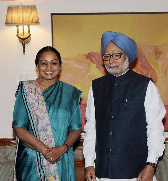 Lok Sabha Speaker Meira Kumar meets Prime Minister Manmohan Singh at his residence in New Delhi.