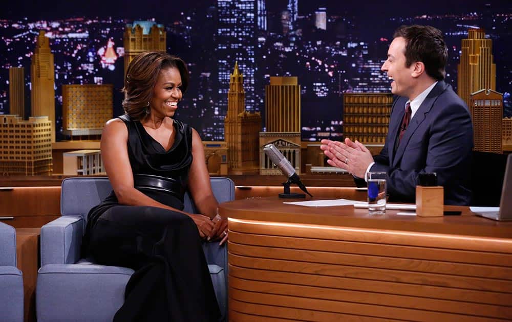 This image provided by NBC Universal First Lady Michelle Obama is seen during an interview with host Jimmy Fallon.