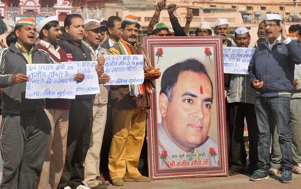 Congress Party workers shouting slogans during a protest against Tamil Nadu Chief Minister Jayalalithaa`s decision to release the assassins of former Prime Minister Rajiv Gandh in Haridwar.
