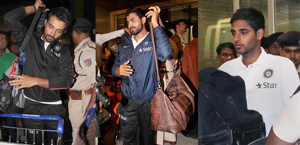 Indian cricketers Ajinkya Rahane, Ravindra Jadeja and Bhuvneshwar Kumar arrive at Chhatrapati Shivaji International Airport in Mumbai on Wednesday night after the New Zealand tour.