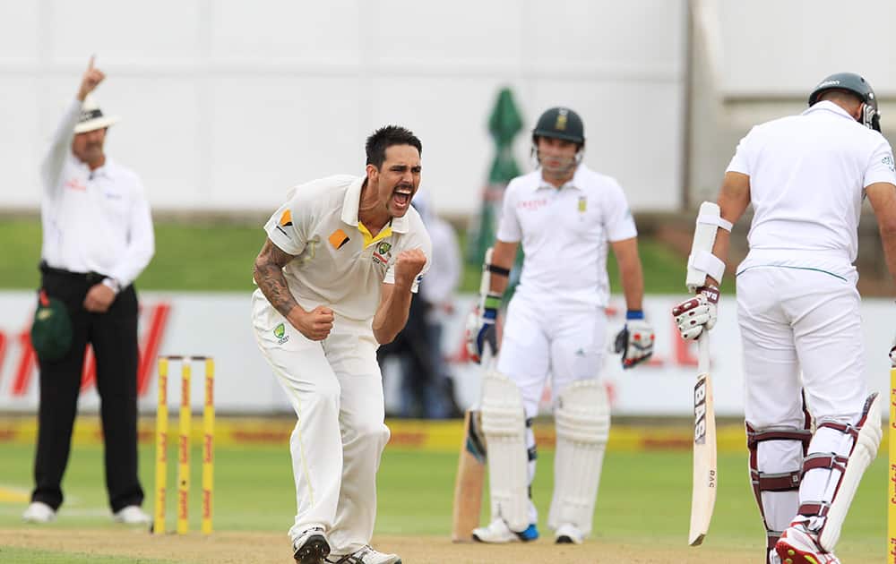 Australia`s bowler Mitchell Johnson reacts as umpire Richard Illingworth of England signals a fall of wicket for South Africa`s batsman Hashim Amla LBW for a duck during first day of their 2nd cricket test match at St George`s Park in Port Elizabeth, South Africa.