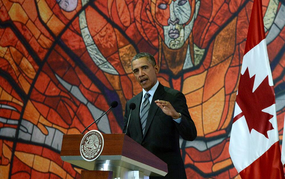 President Barack Obama speaks at the North American Leaders Summit closing news conference in Toluca, Mexico. Obama was in Toluca for a one-day summit with Mexican and Canadian leaders, meeting on issues of trade and other neighbor-to-neighbor interests.