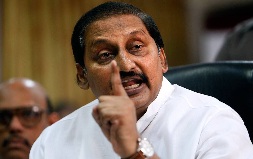 Chief Minister of Indian state of Andhra Pradesh N Kiran Kumar Reddy announces his resignation from his post and Congress party during a press conference, in Hyderabad.
