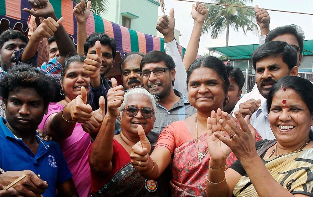 Arputham Ammal (C), mother of Perarivalan, one of the convicts in the former Prime Minister Rajiv Gandhi assasination case, celebrates with relatives and supporters in Chennai after the Supreme Court on Tuesday commuted the death penalty of the three convicts in the case to life term.
