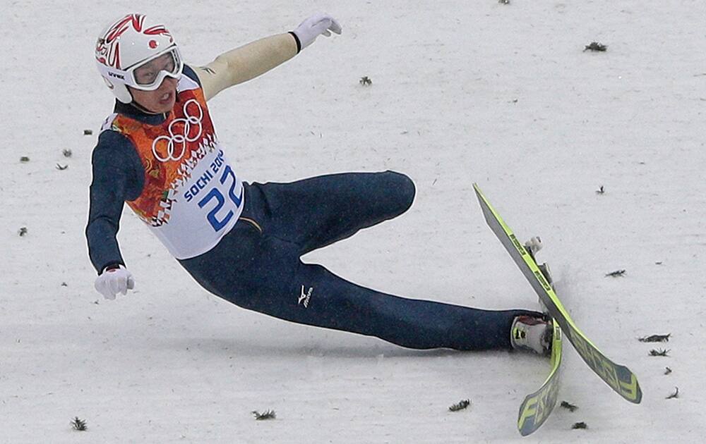 Japan`s Taihei Kato falls during the Nordic combined individual Gundersen large hill competition at the 2014 Winter Olympics in Krasnaya Polyana, Russia.