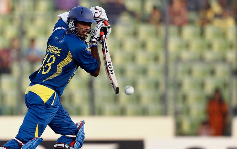 Sri Lanka’s Sachithra Senanayake plays a shot against Bangladesh during their first one day international cricket match in Dhaka, Bangladesh.