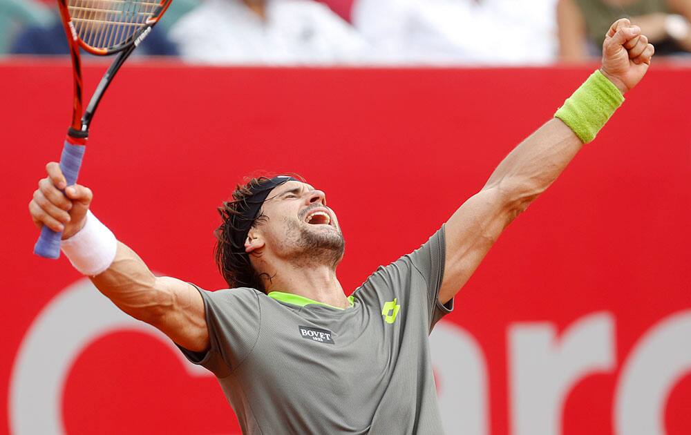 David Ferrer of Spain celebrates after defeating Fabio Fognini of Italy in the final match of the Buenos Aires` Copa Claro tennis Open in Buenos Aires, Argentina.