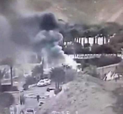 An image made from a video provided by the Israeli Airports Authority shows smoke from the bombing of the bus carrying South Korean sightseers near the tip of the Red Sea`s Gulf of Aqaba.