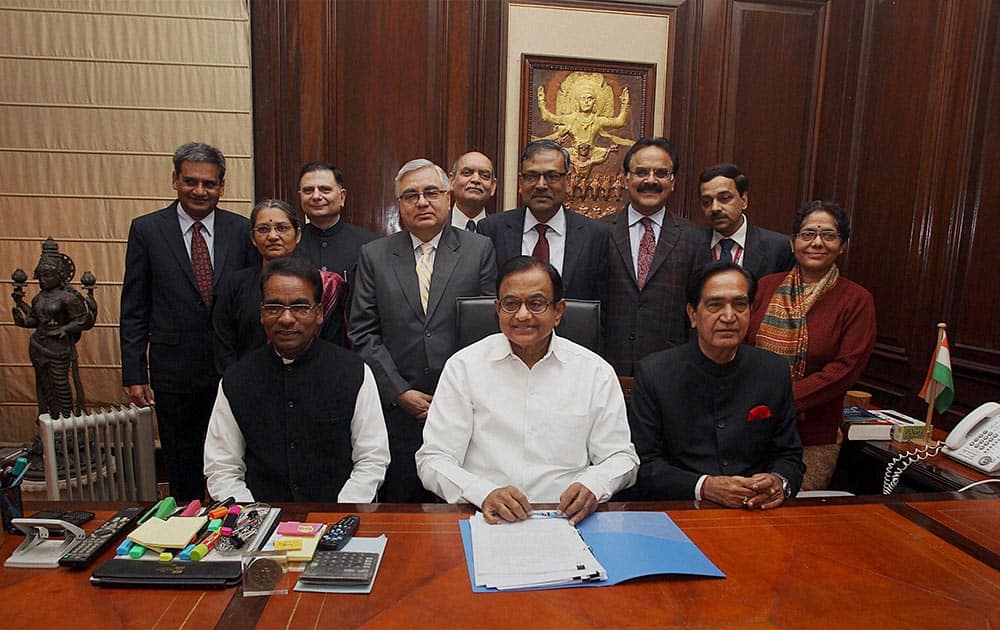 Finance Minister P Chidambaram along with MoS for Finance Namo Narain Meena and J.D. Seelam others giving final touches to the interim budget before its presentation in the Lok Sabha, in New Delhi.