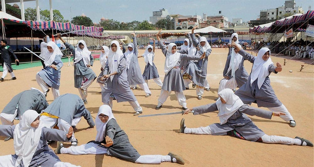 Students performing Martial arts during rally to promote Islamic education among young generation in Hyderabad.