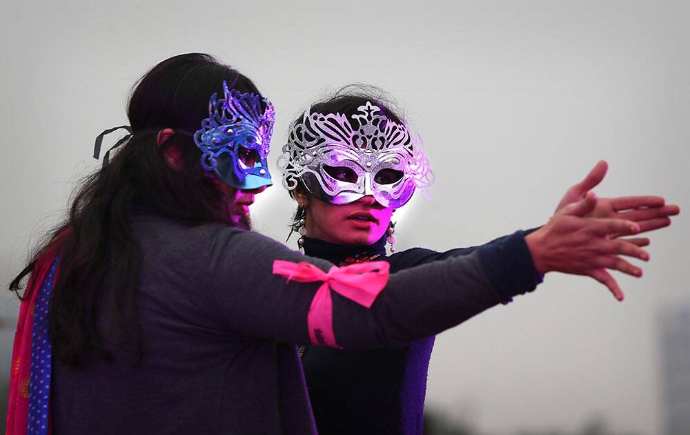 Indian activist perform during the `One Billion Rising Campaign` program in New Delhi, India. One Billion Rising is a global campaign that aims, for one billion people from all over the world to rise together to demand that violence against women and girls ends.