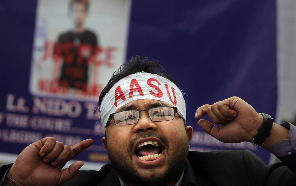 A member of the North East Students Organization (NESO) shouts slogans as he participates in a protest in Gauhati, India.