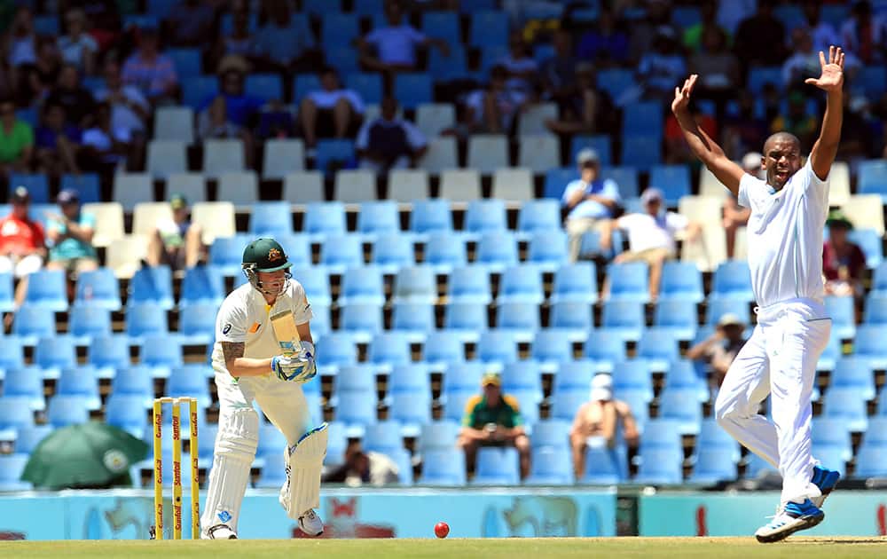 Australia`s captain Michael Clarke watches as South Africa`s bowler Vernon Philander appeals for LBW against him on the first day of their their cricket Test match at Centurion Park in Pretoria, South Africa.
