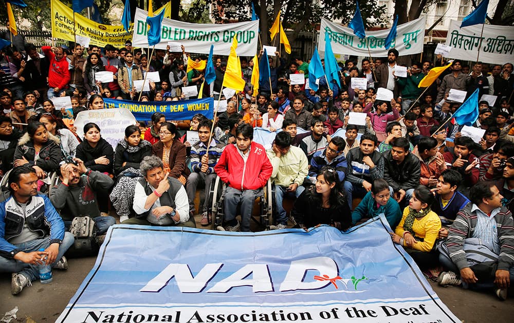 Activists of various disabled rights groups participate in a sit-in protest outside the Indian ministry of social justice to urge the passage of the disability rights bill in parliament in New Delhi.
