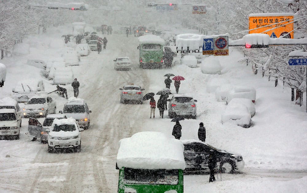 A road is covered with heavy snow as more than one meter of snow fell last week in Gangneung, South Korea.