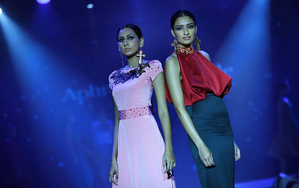 Sri Lankan models display a creation by Sri Lankan designer Aphrodite`s Myrtle during Colombo Fashion Week in Colombo, Sri Lanka.