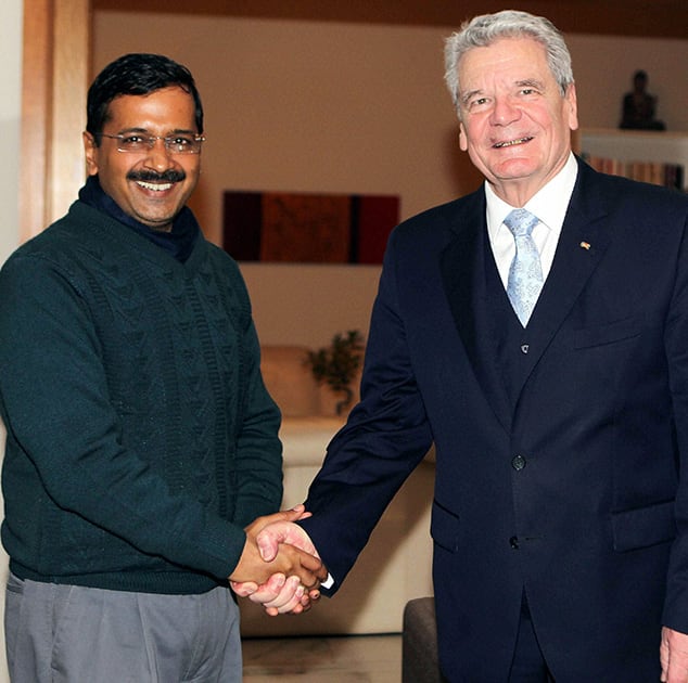 German President Joachim Gauck shakes hands with Delhi Chief Minister Arvind Kejriwal at a meeting in New Delhi.