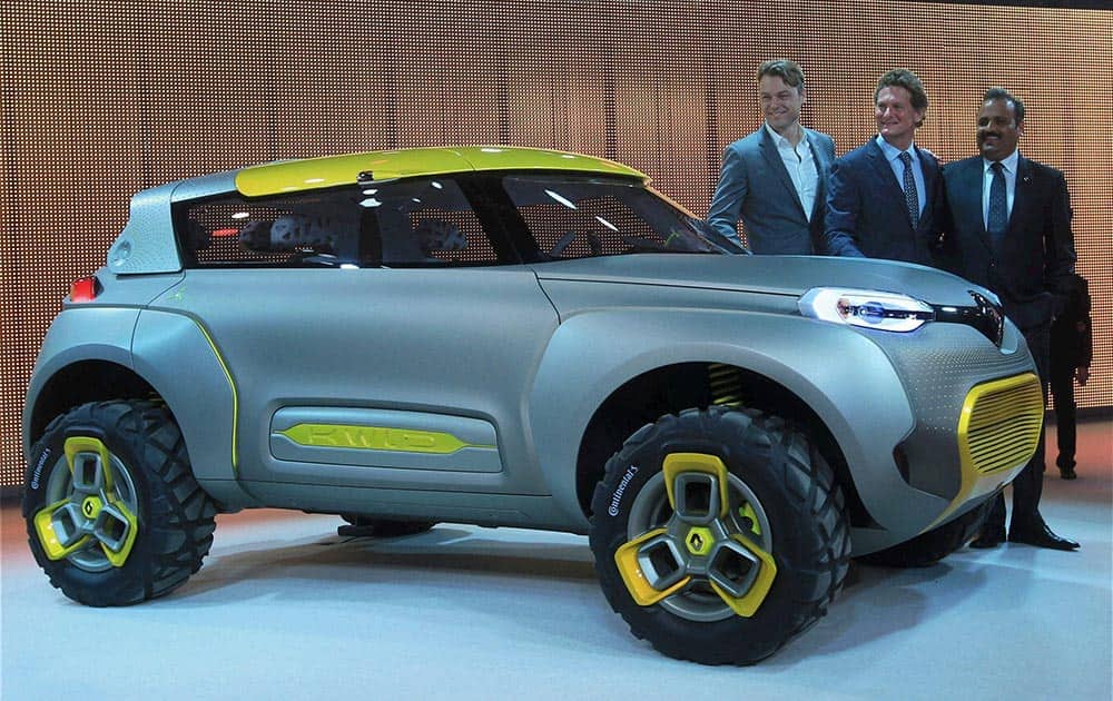 Gilles Normand, Senior Vice President & Chairman Asia Pacific Region, Renault, and Sumit Sawhney, Country CEO & Managing Director, Renault Operations in India at the unveling of the concept car KWID during the 12th Auto-Expo 2014 at Greater Noida.